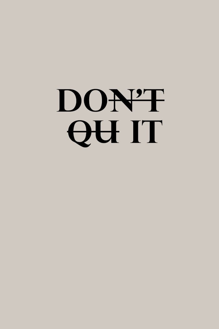 Motivational u0022Don't Quitu0022 text on a minimalist background, perfect for inspiration.